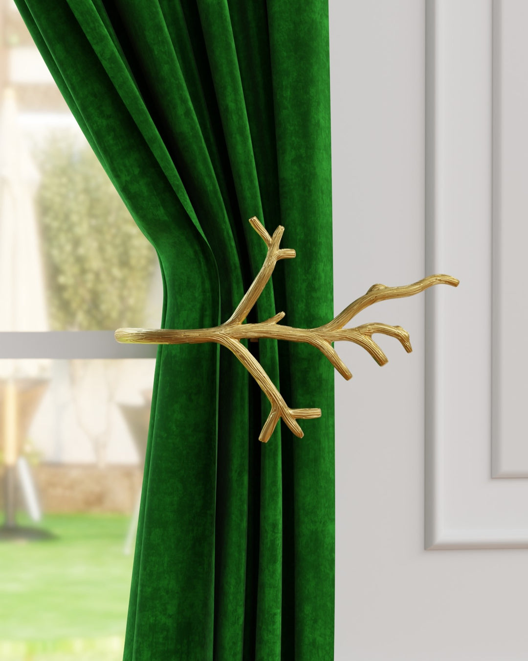 Decorative Amalfi curtain holdbacks with gold finish and intricate detailing.