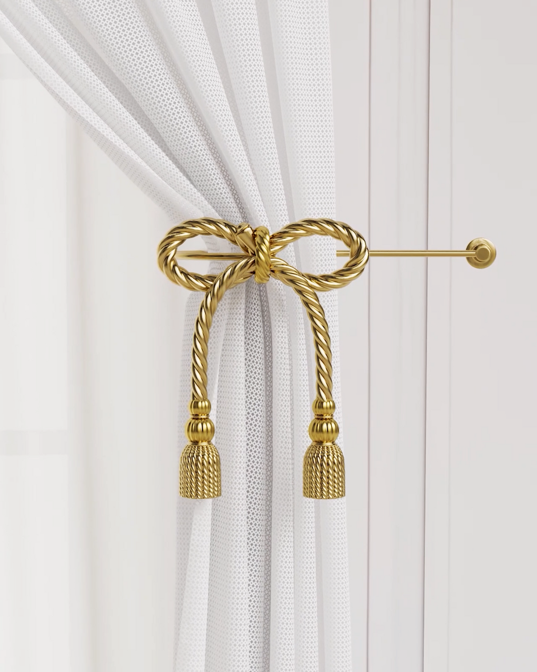 Cordelia rope-inspired curtain holdbacks in decorative sculpted metal.