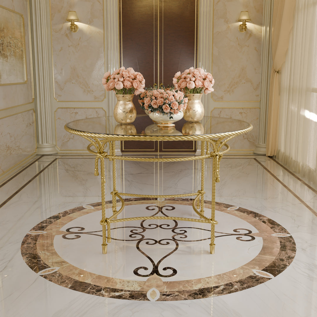 Grand Cordelia round table with rope-inspired forged metal base and circular glass top.