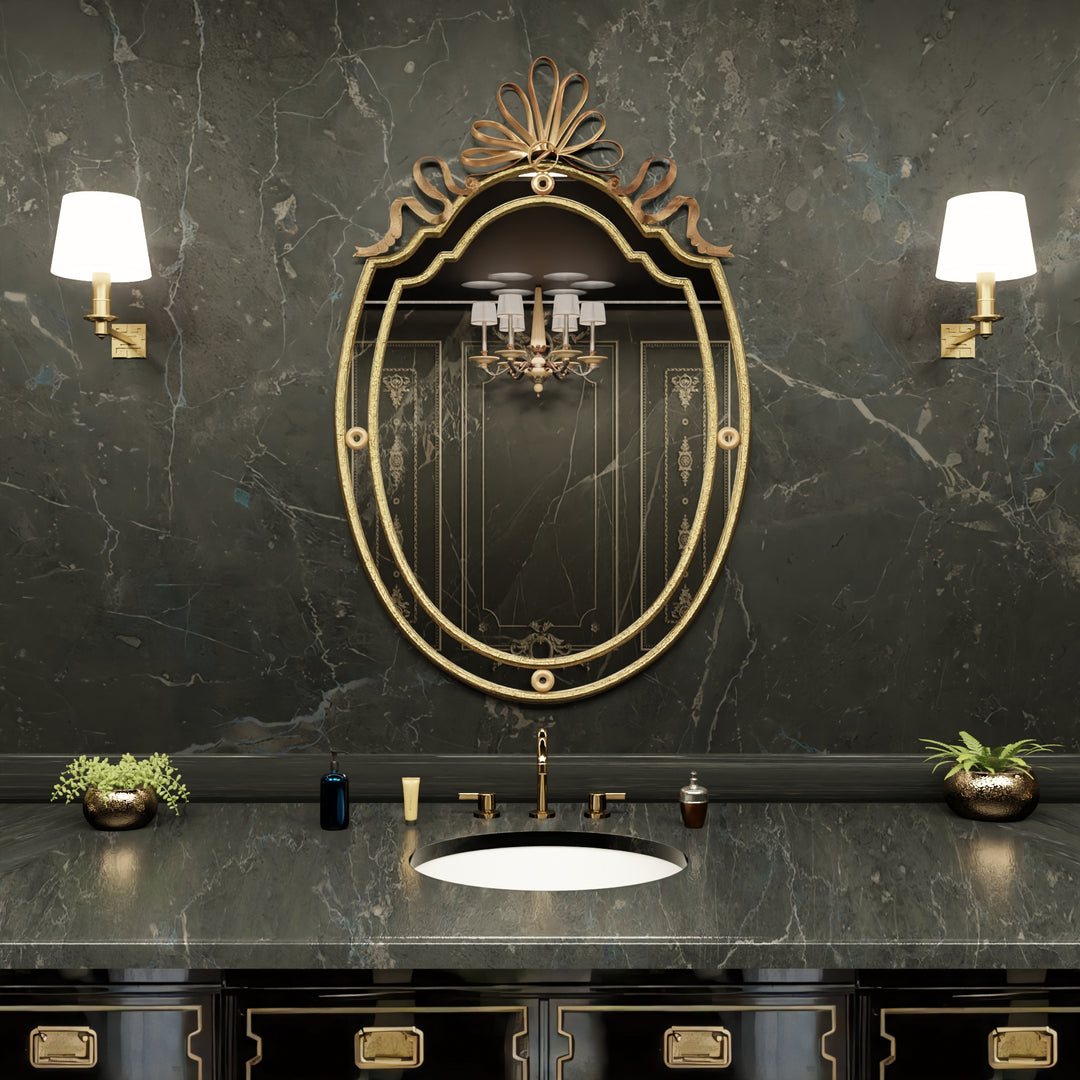 Harmony mirror with antique gold finish and elegant ribbon embellishment.