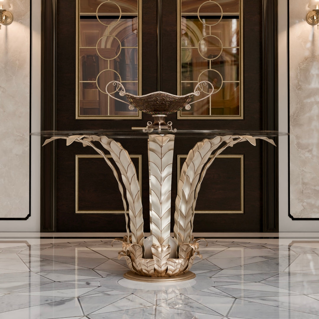 Round entrance table with leaf-detailed wrought iron base and glass top.