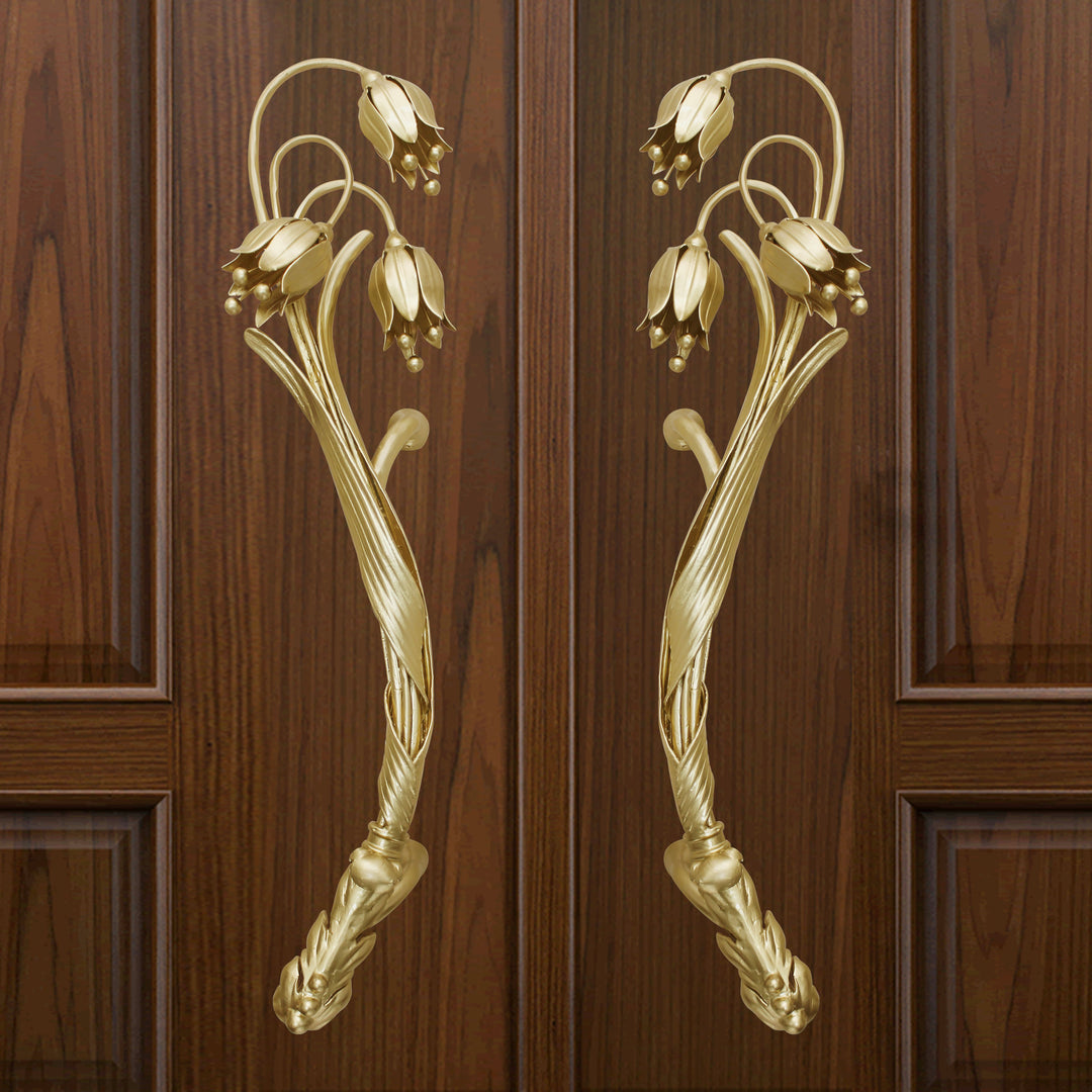 Angelina door handles with forged blossom and leaf detailing, inspired by snowdrops.