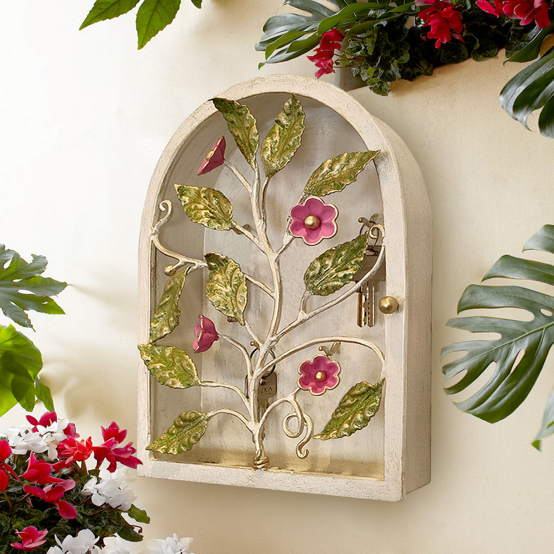 Decorative wall-mounted key box with floral vine design and hand-painted flowers