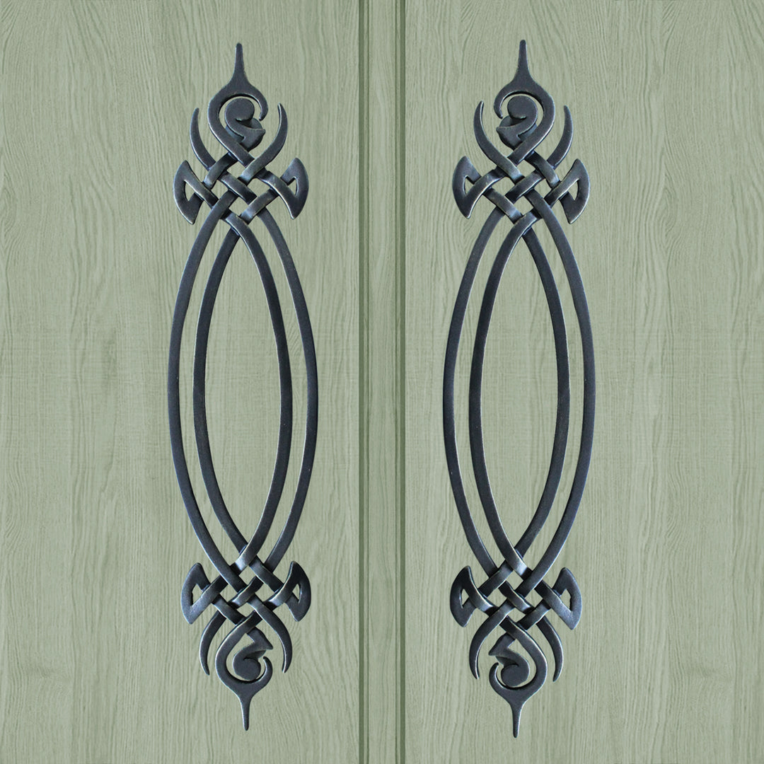 Athena door handles with elegant silhouette and forged metal detail.