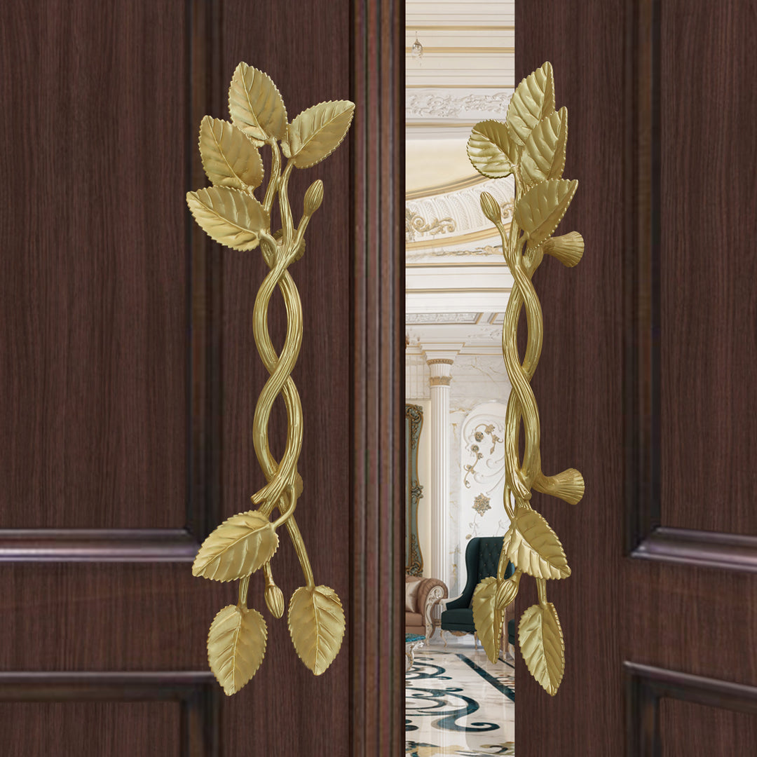 Aurora gold door handles with intertwined stems and sculpted leaves by Choufani