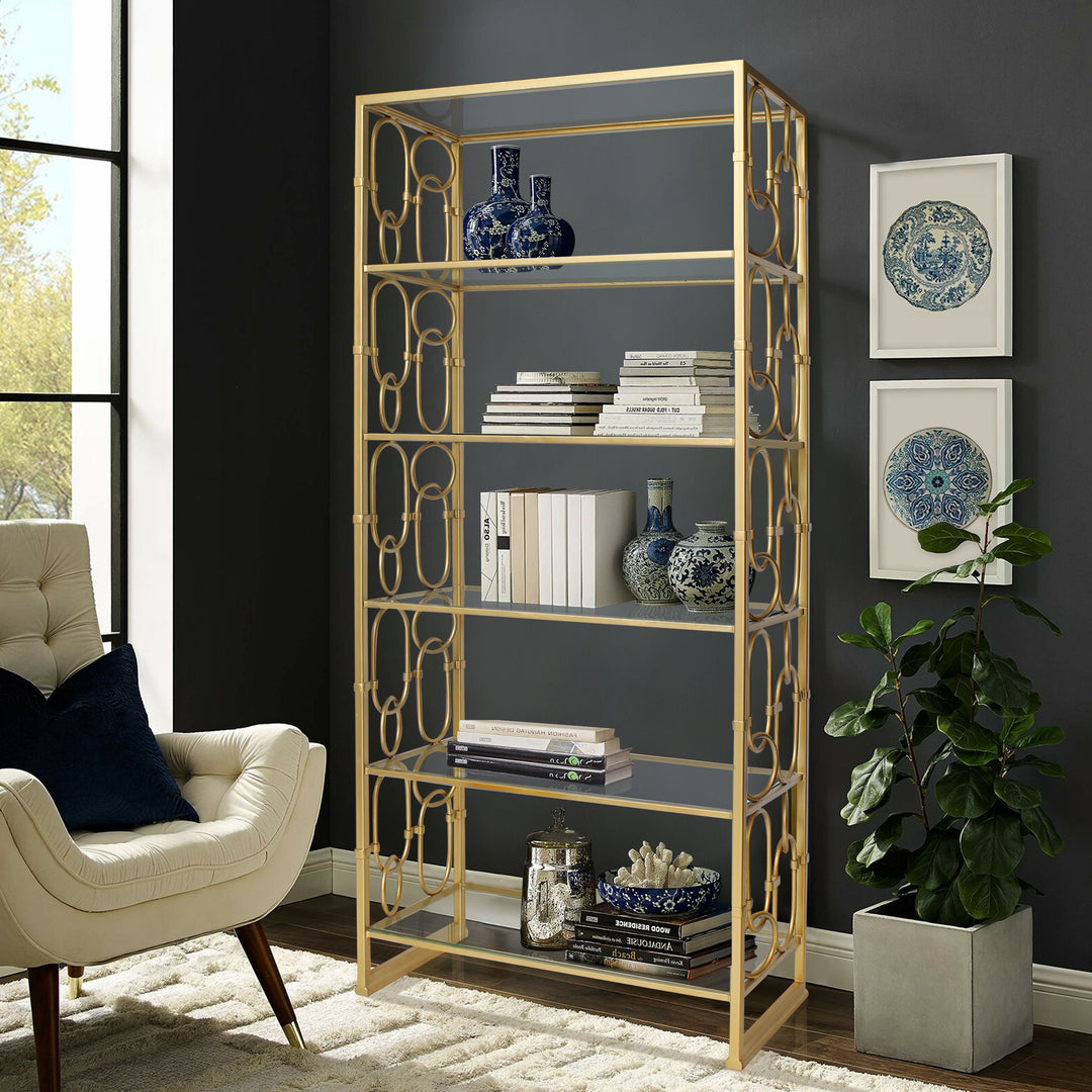 Catena gold metal bookcase with open shelves and decorative side pattern