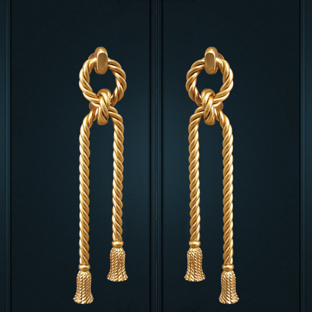 Cordelia door handles with rope-inspired sculptural metalwork.