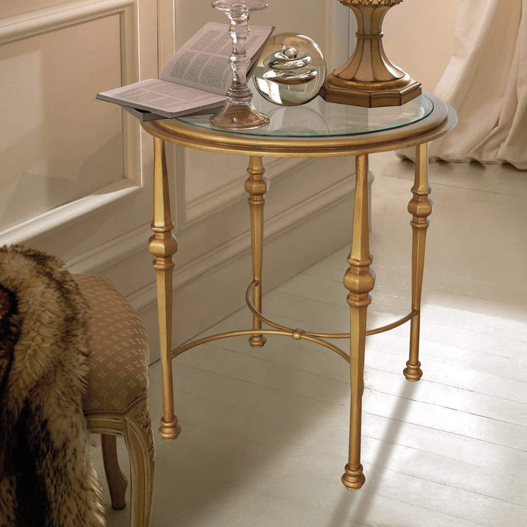 Diana round metal side table with gold finish and glass beveled top.