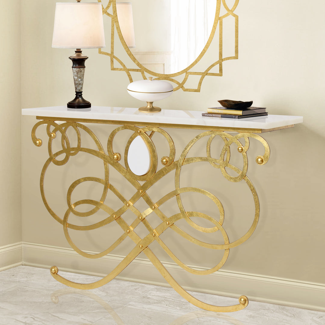 Farah console table with gold scrollwork base and white top in a luxury interior setting by Choufani