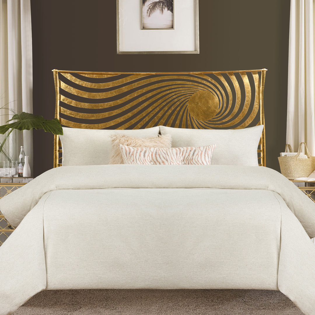 Ferrara gold leaf metal bed with sunburst headboard in modern room