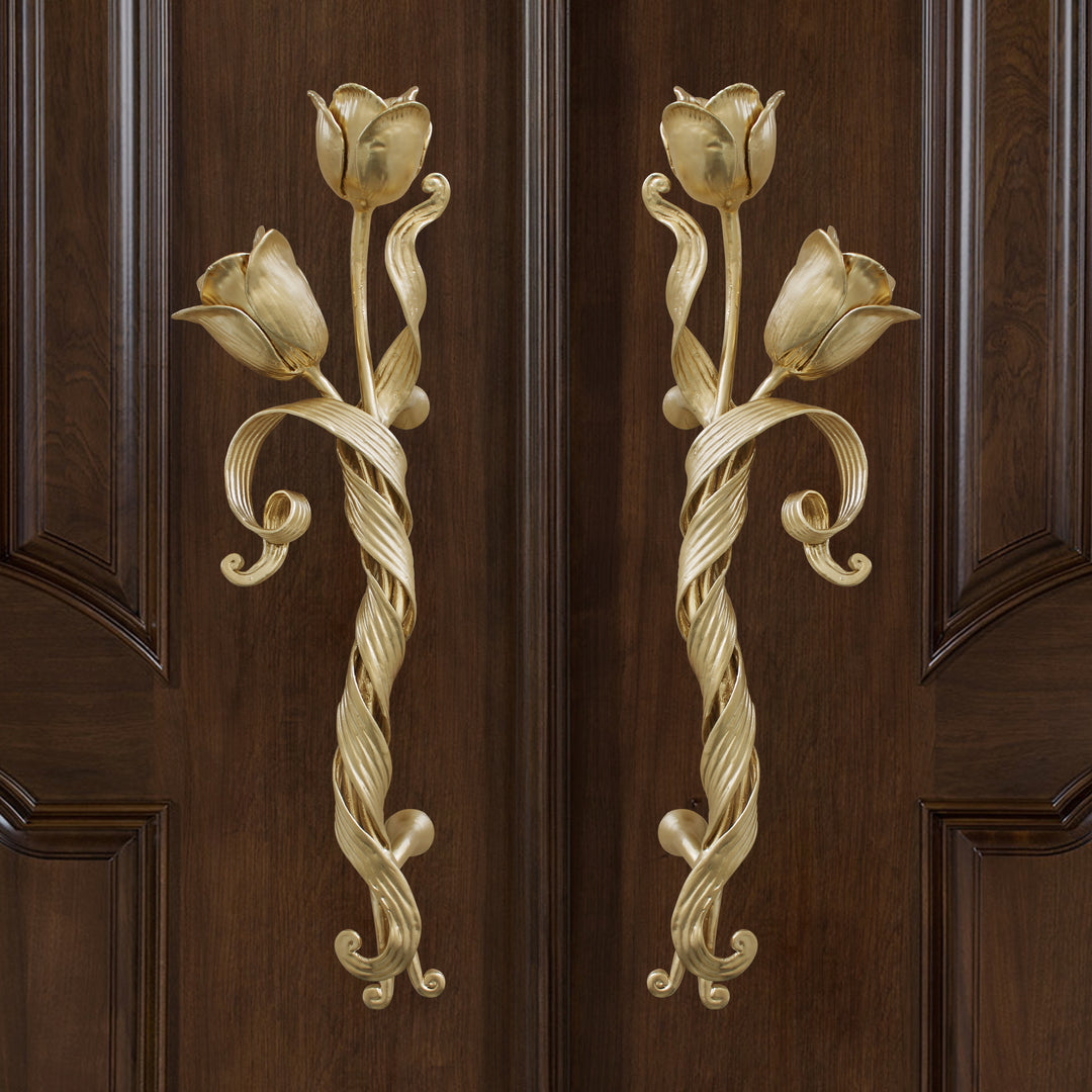 Juliana tulip-inspired door handles with tapered forged metal design.