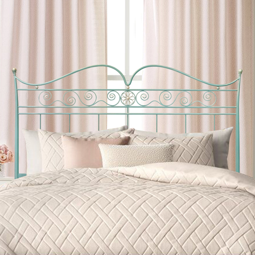 Stella queen-size bed with curved iron frame and floral medallion detail by Choufani