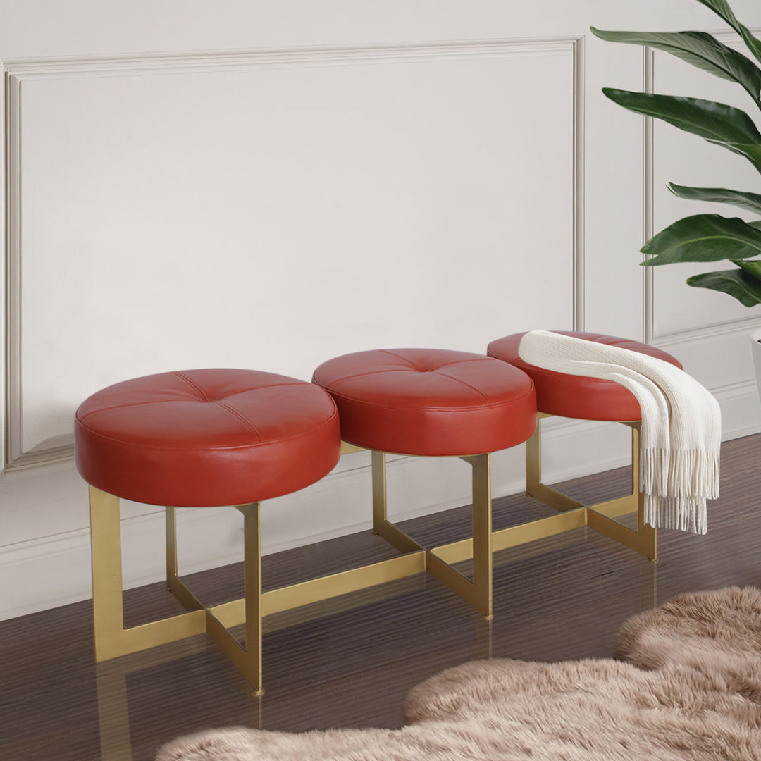 Turin red leather bench with three round seats and gold metal frame