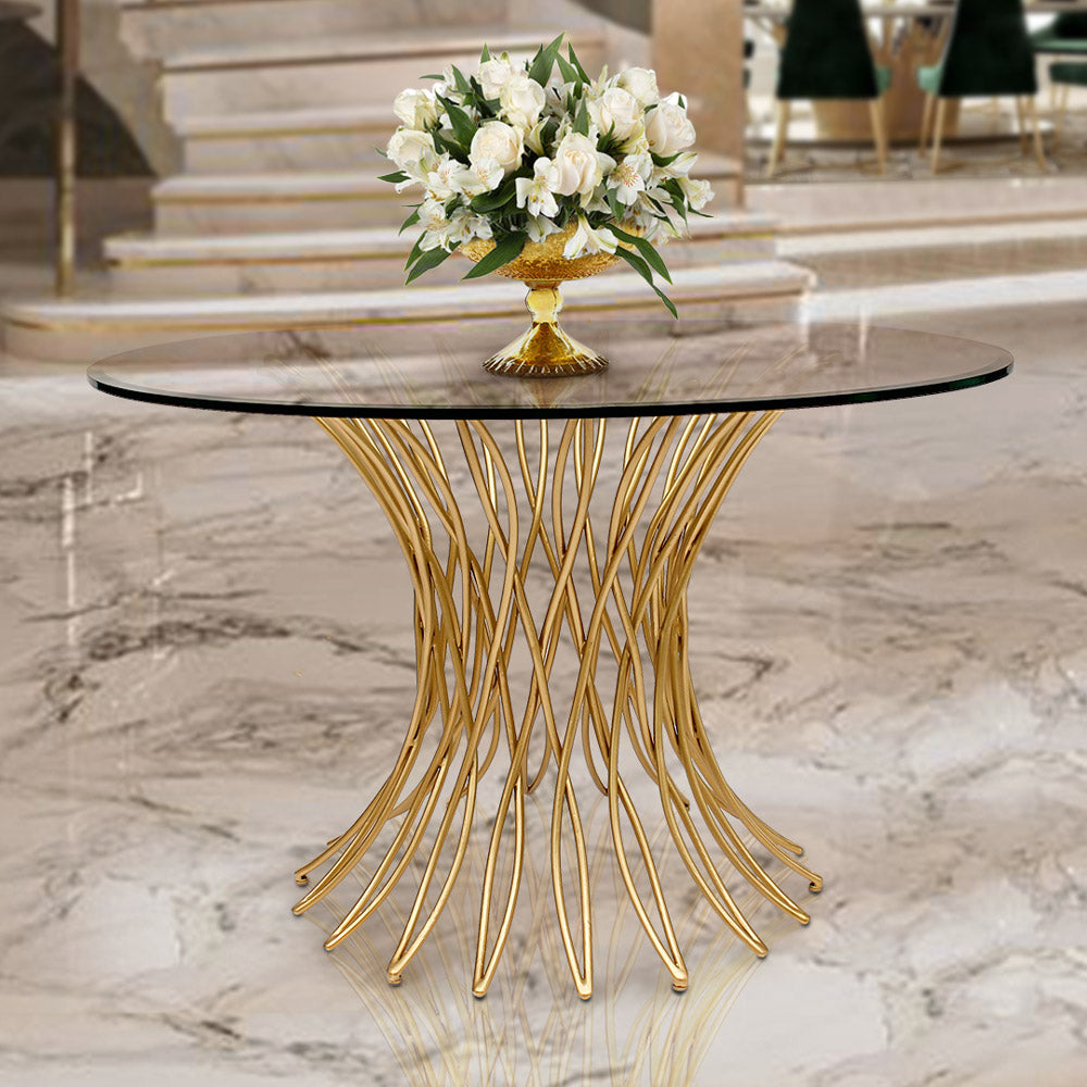 Valerie entrance table with sculptural gold base and round glass top