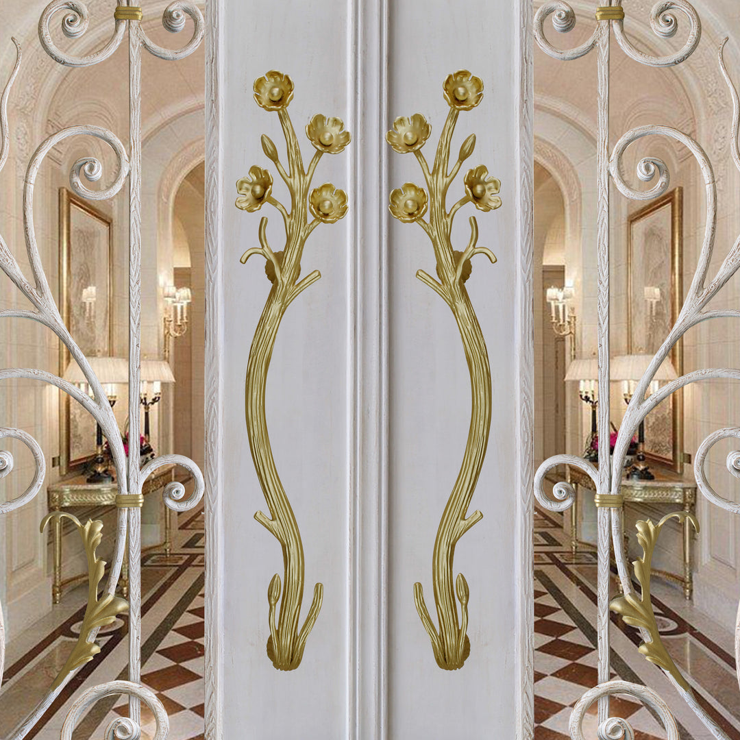 Violetta gold door handles with sculpted blooming flowers and elongated stems by Choufani