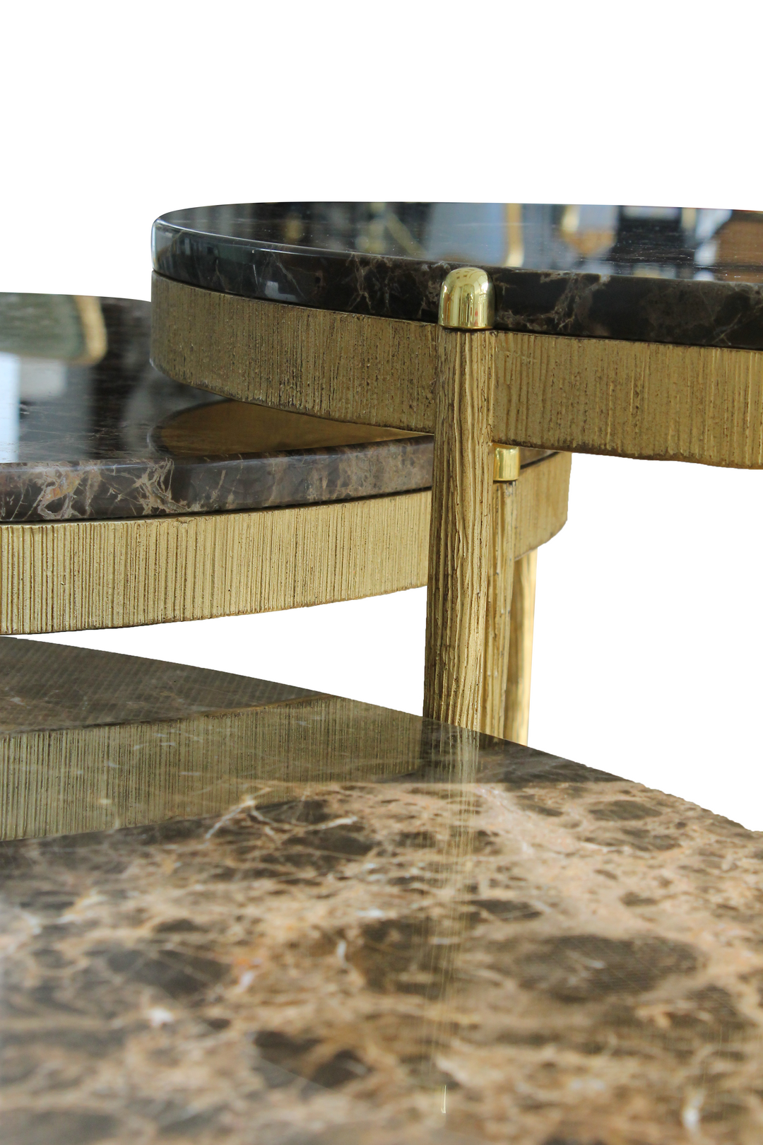 Detailed closeup of sleek steel nesting tables with beautiful, polished marble surfaces