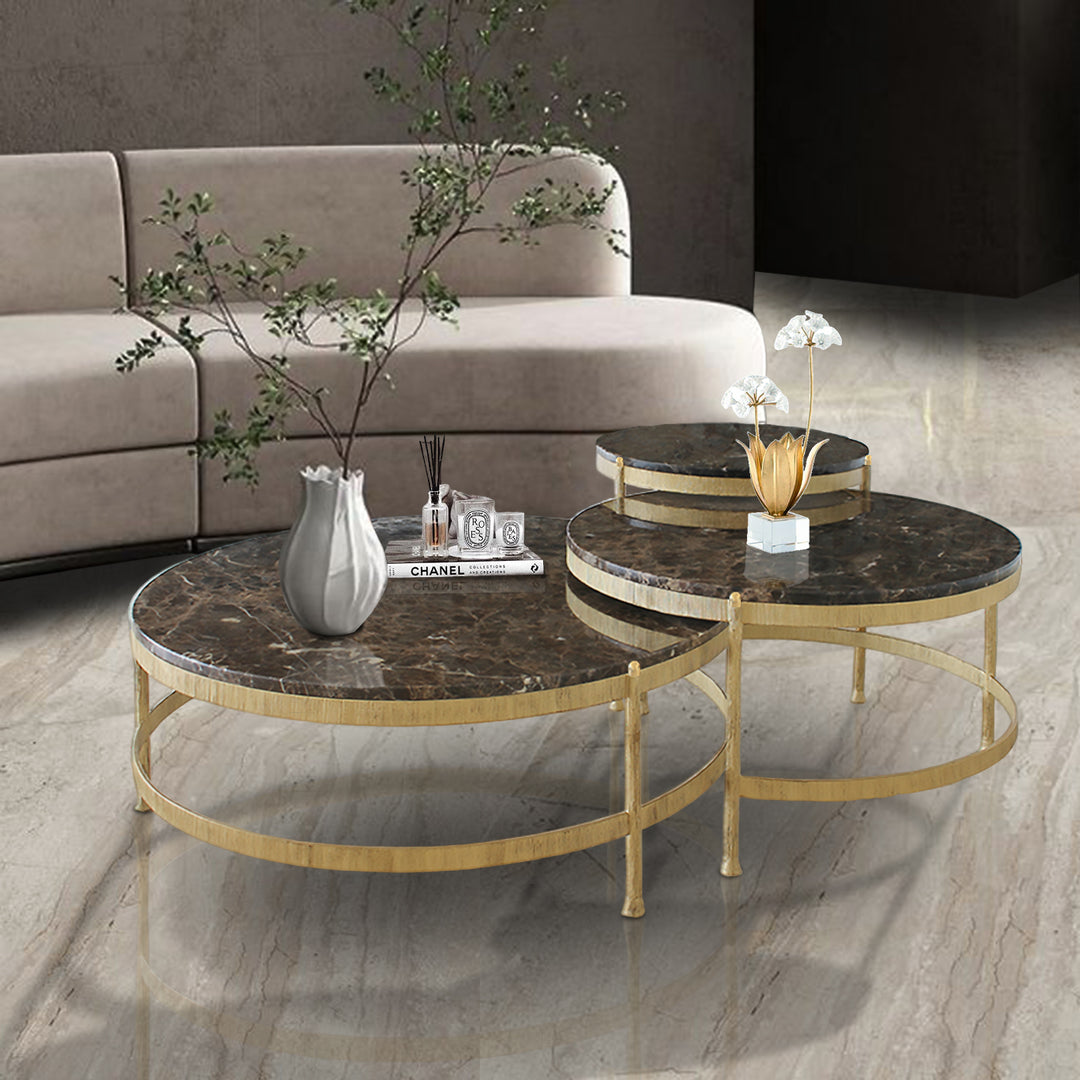 Set of contemporary steel nesting tables with elegant marble tops, perfect for modern interior decor