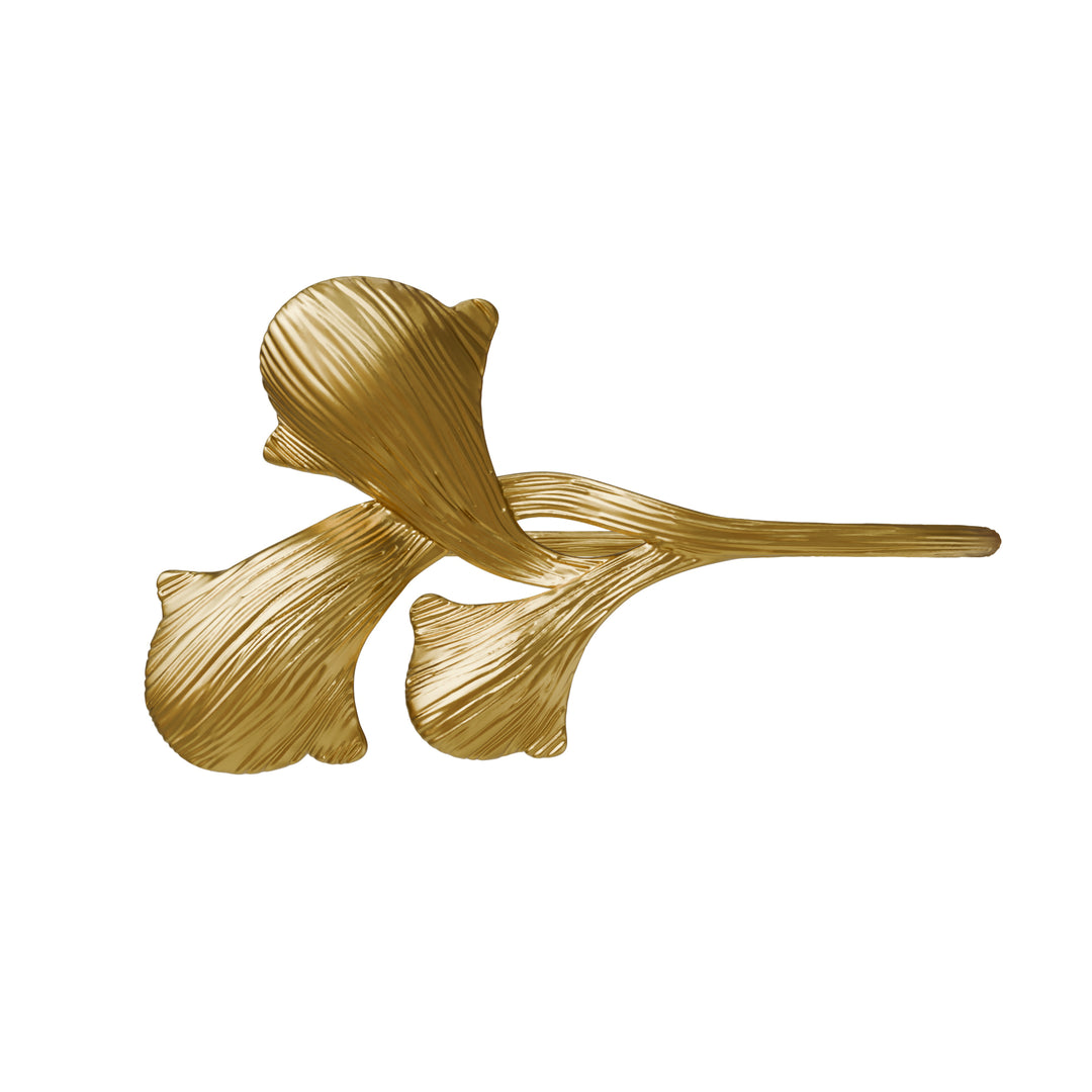 Gold gingko-shaped curtain tieback on a white background