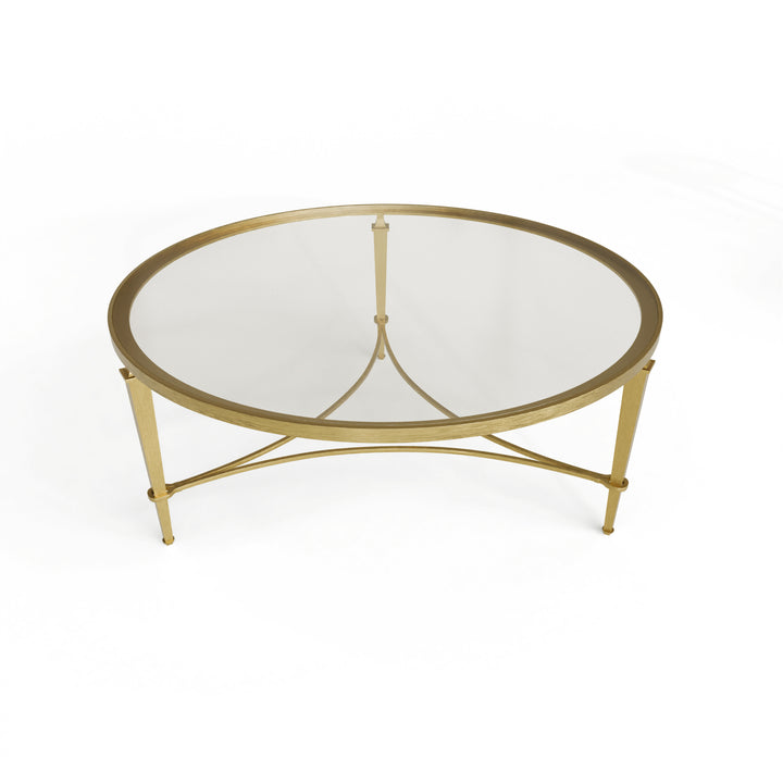 Victoria Table — elegant gold and glass centerpiece with sculpted legs, handcrafted by Choufani