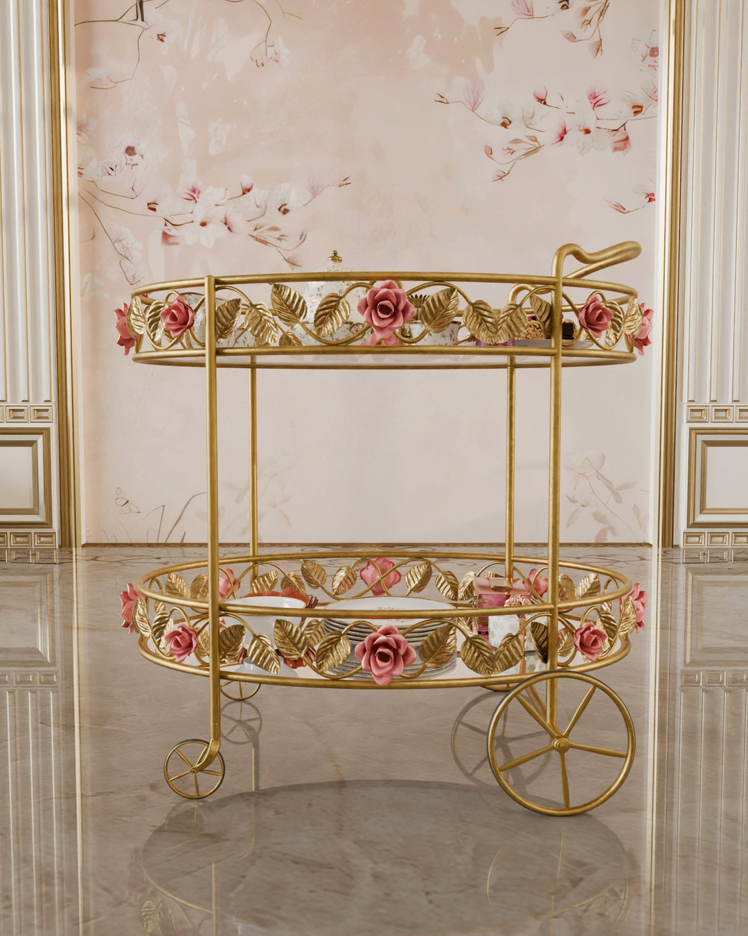 Front view of the Juliet serving trolley in gold, featuring hand-forged pink roses, leaf motifs, and double glass shelves
