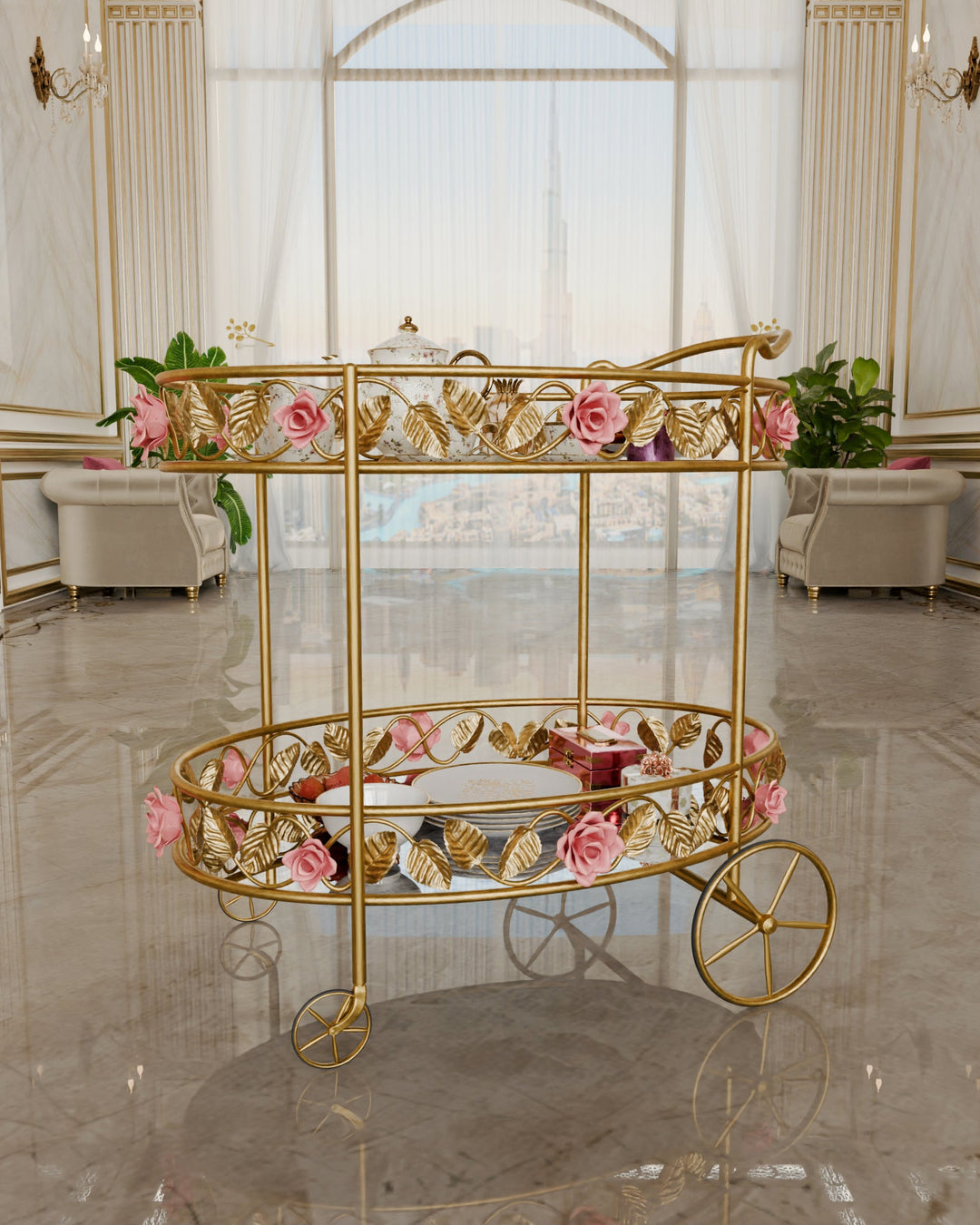 Gold Juliet serving trolley with glass shelves and pink rose metalwork, styled with tea service in an elegant living room