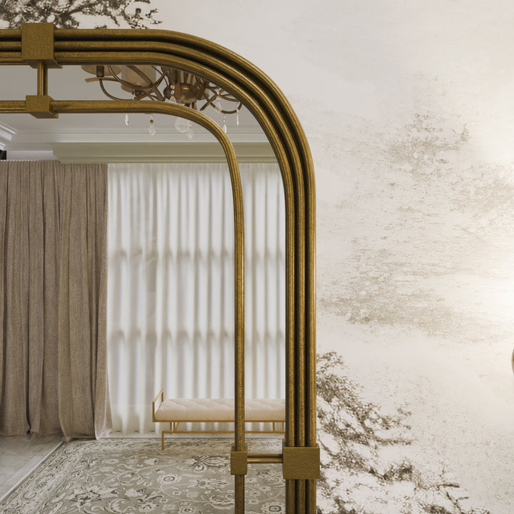Close-up of the Selina mirror showing its brushed gold frame and tiered arched design