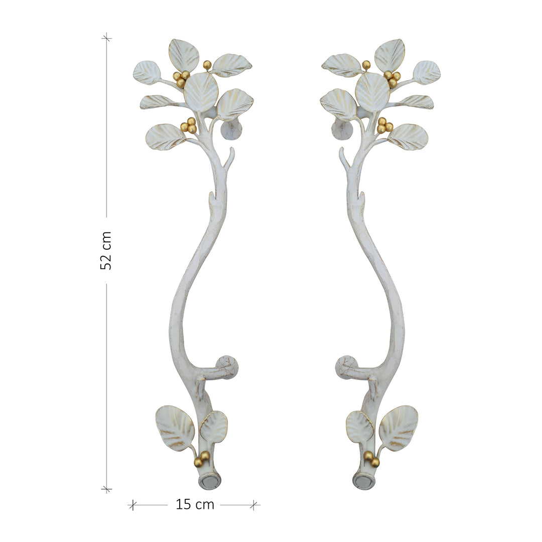 A pair of white and gold accent pull handles inspired by nature's leaves