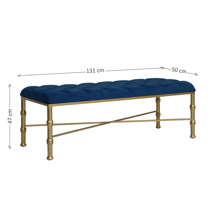 Accent metal golden bench with bamboo styled legs, topped with a navy blue capitone cushion, with annotated dimensions