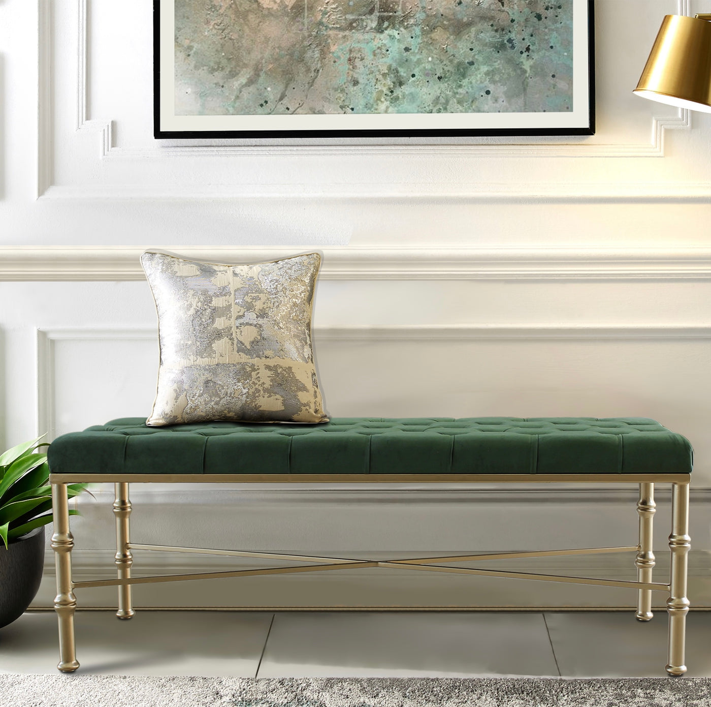 Upholstered velvet bench with golden forged steel legs 