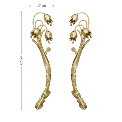 A pair of golden decorative pull handles inspired by the snowdrop flower with annotated dimensions