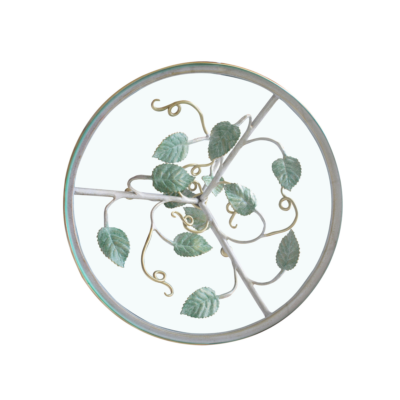 Top view of a round decorative cake plate inspired by leaves and branches; topped with a clear round glass