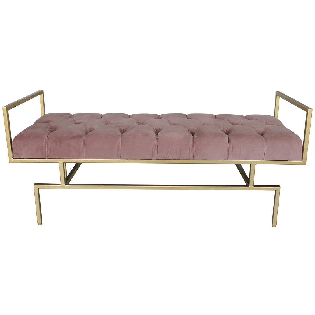 A contemporary metal golden bench with modern styled legs, topped with a lilac velvet tufted cushion
