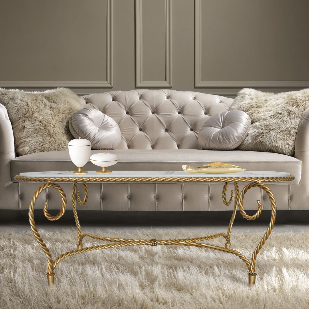 Luxury handmade oval shaped center table in golden color inspired by twisted rope