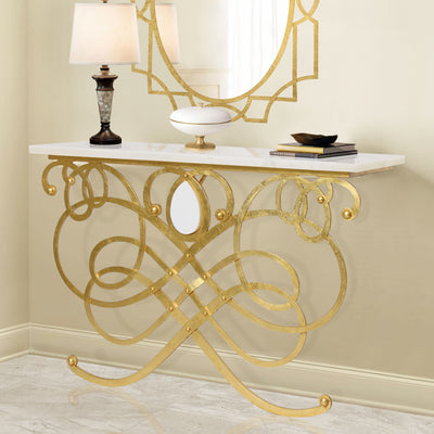 A luxurious handmade metal console table inspired by musical notes in a gold leaf finish, topped with white marble