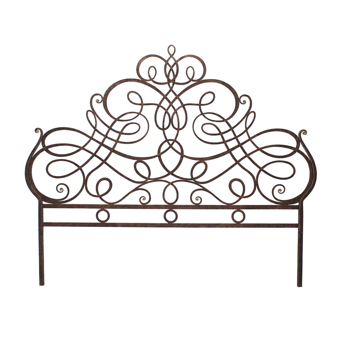 A luxurious metal king sized headboard with an organic style painted in an antique bronze finish