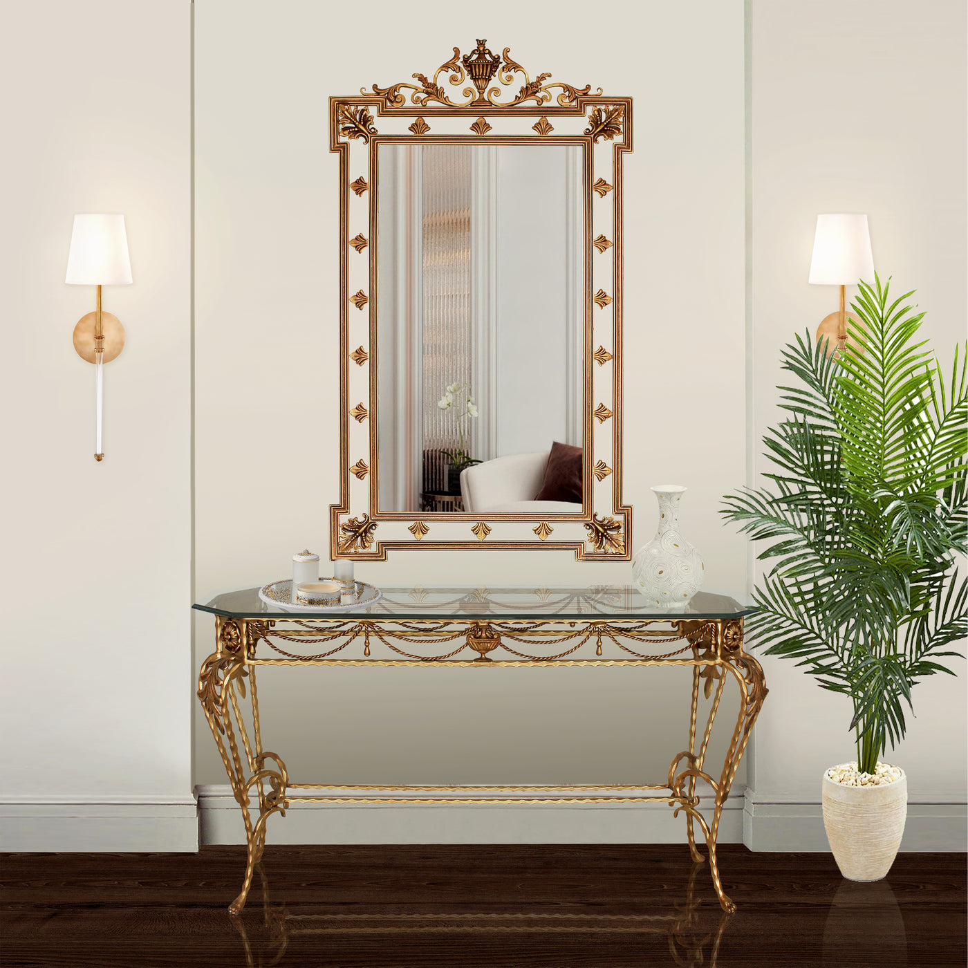 A classical wrought iron console table and mirror painted in an antique golden finish in a luxurious living space