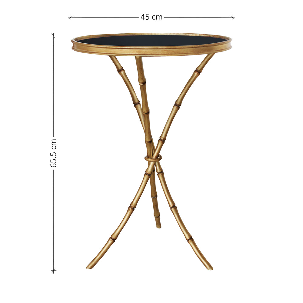Contemporary end table with golden bamboo legs and glass top with annotated dimensions