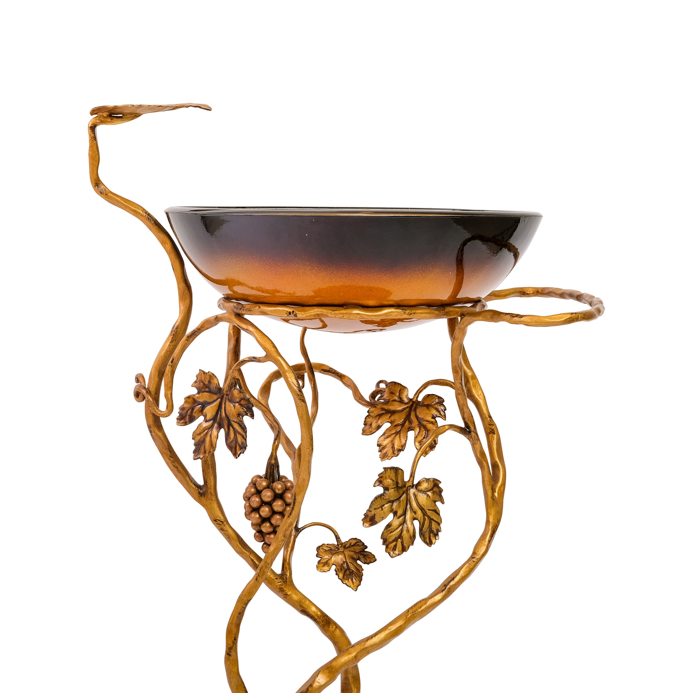 Close up of a wrought iron wash basin stand inspired by grape vines and painted in an antique golden finish