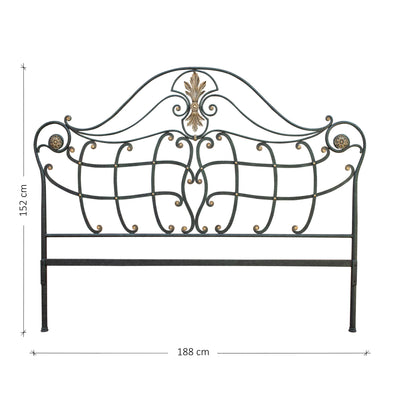 A classical wrought iron double bed headboard, painted in an antique green and gold finish; with annotated dimensions