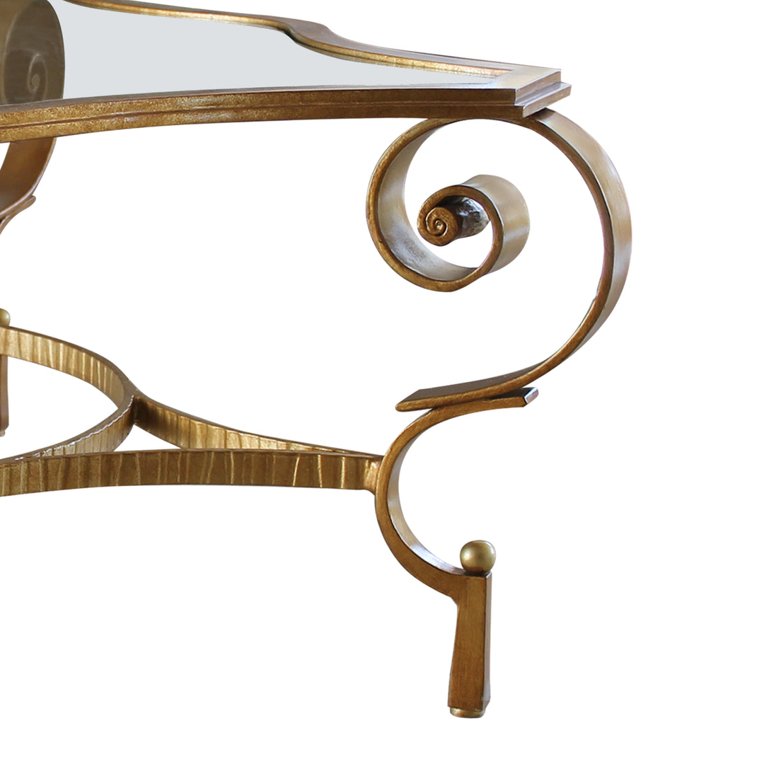 Detail scroll highlighting the design of classical coffee table topped with glass