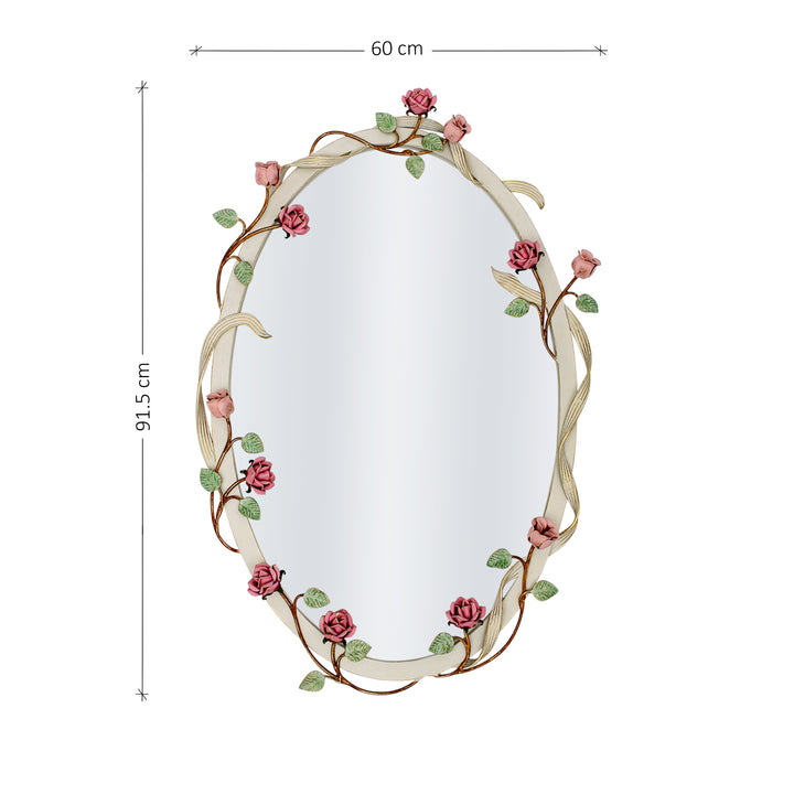 An oval shaped mirror with a wreath of pink roses and green leaves wrapped along its border; with annotated dimensions