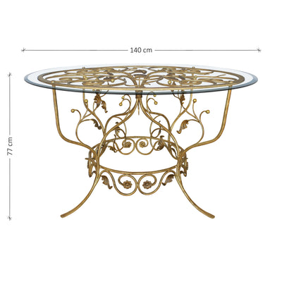 A luxurious round entryway table with a classical metal forged base, topped with a clear circular glass; with annotated dimensions