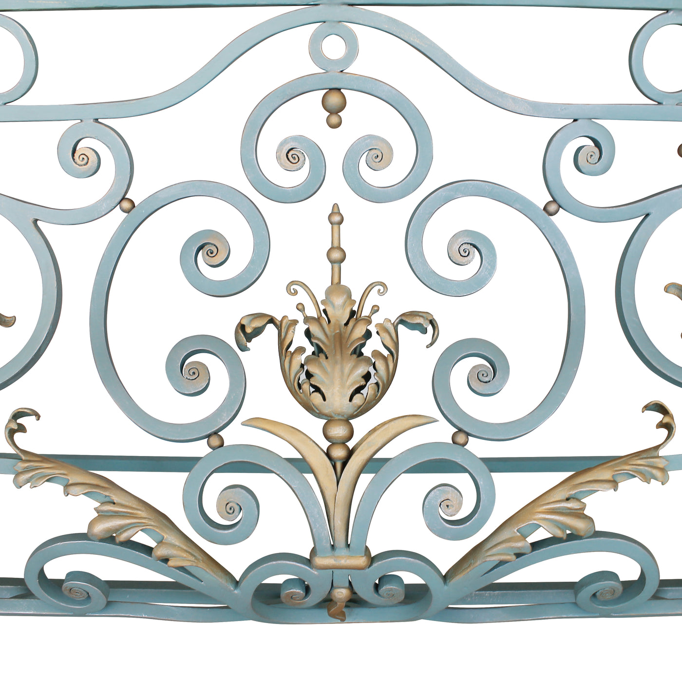 Close up of a classical console base made up of blue wrought iron scrolls and golden leaves