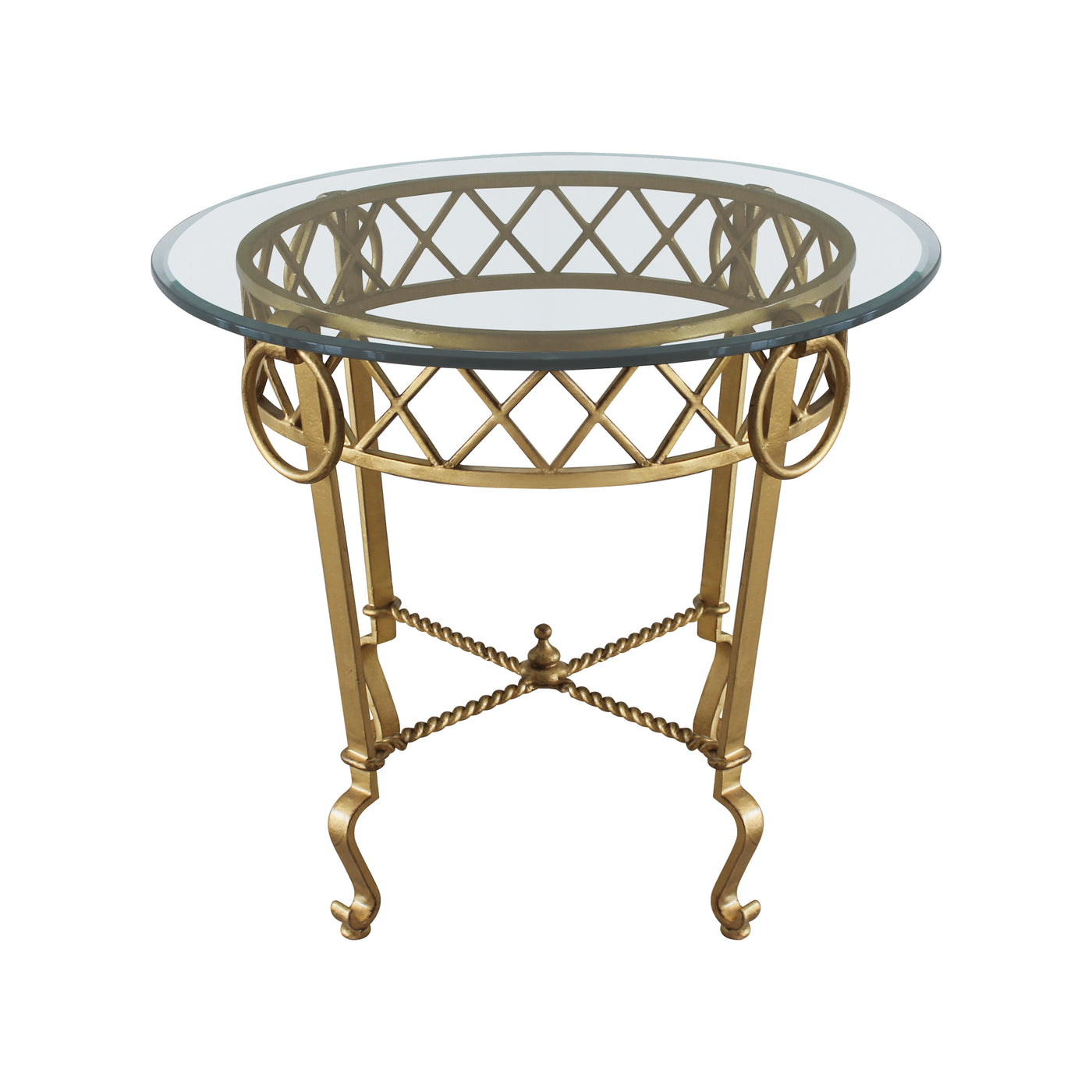 A classical wrought iron table painted in antique gold finish and topped with a clear round glass