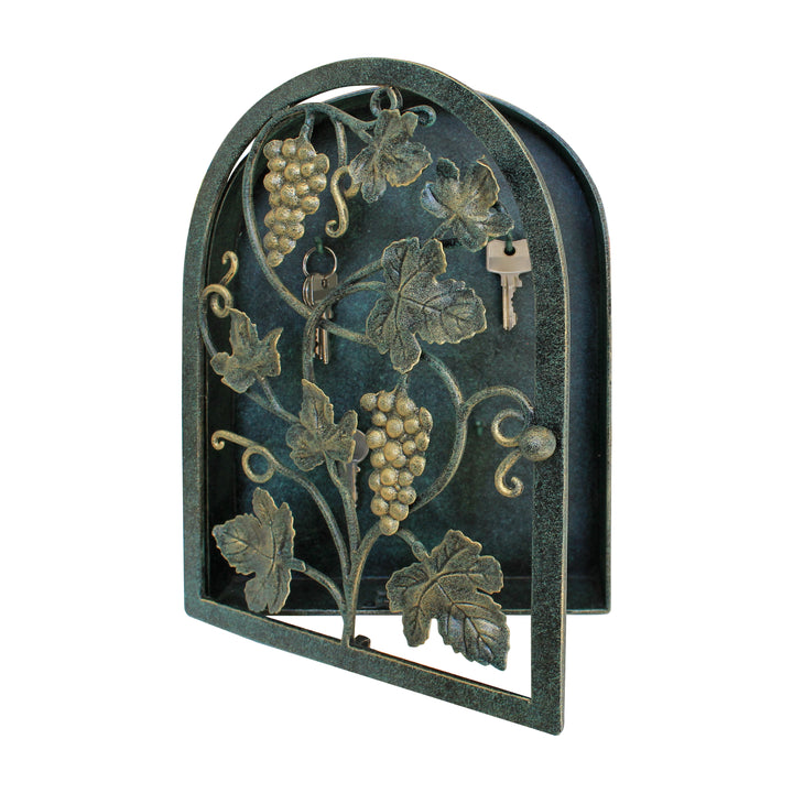 An opened arched rustic key holder inspired from grape vines painted in antique green
